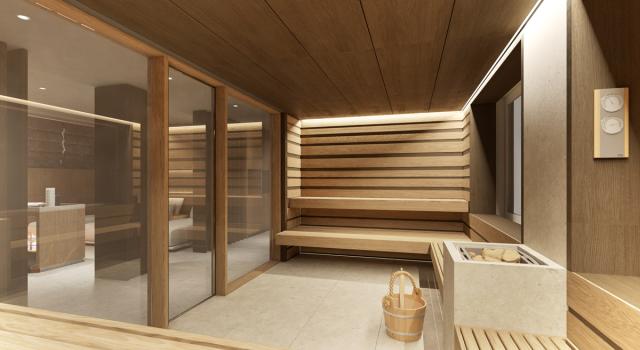 Moderna sauna in legno con pareti in vetro e secchio per acqua.